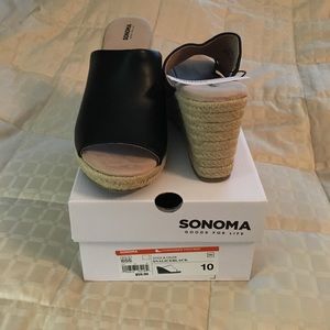 NIB black wedges