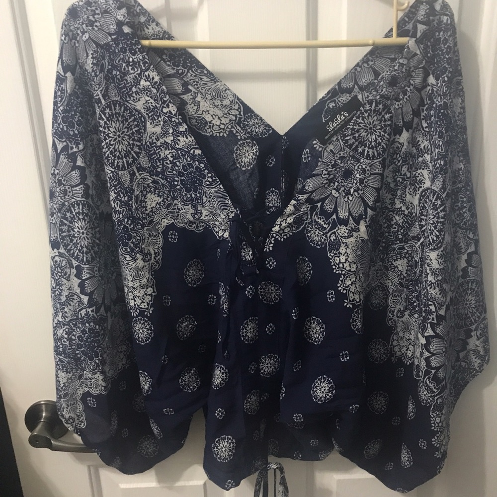 Lulu's flutter sleeve top with lace up front