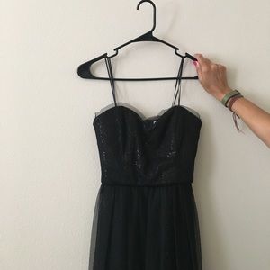 Black sequin and mesh evening gown