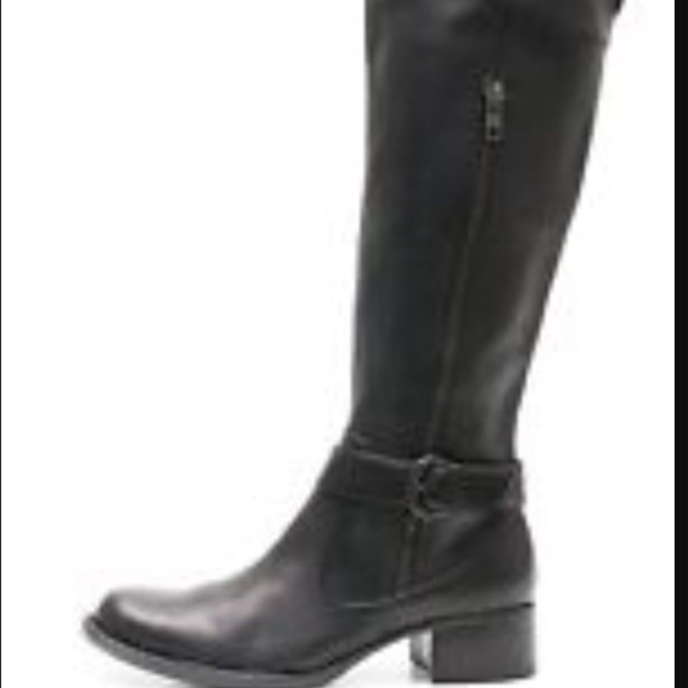 Crown by Born over the knee black leather boots.