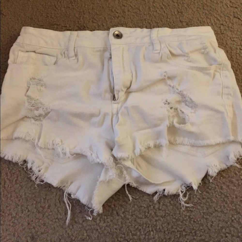 KLIQUE B White ripped shorts
