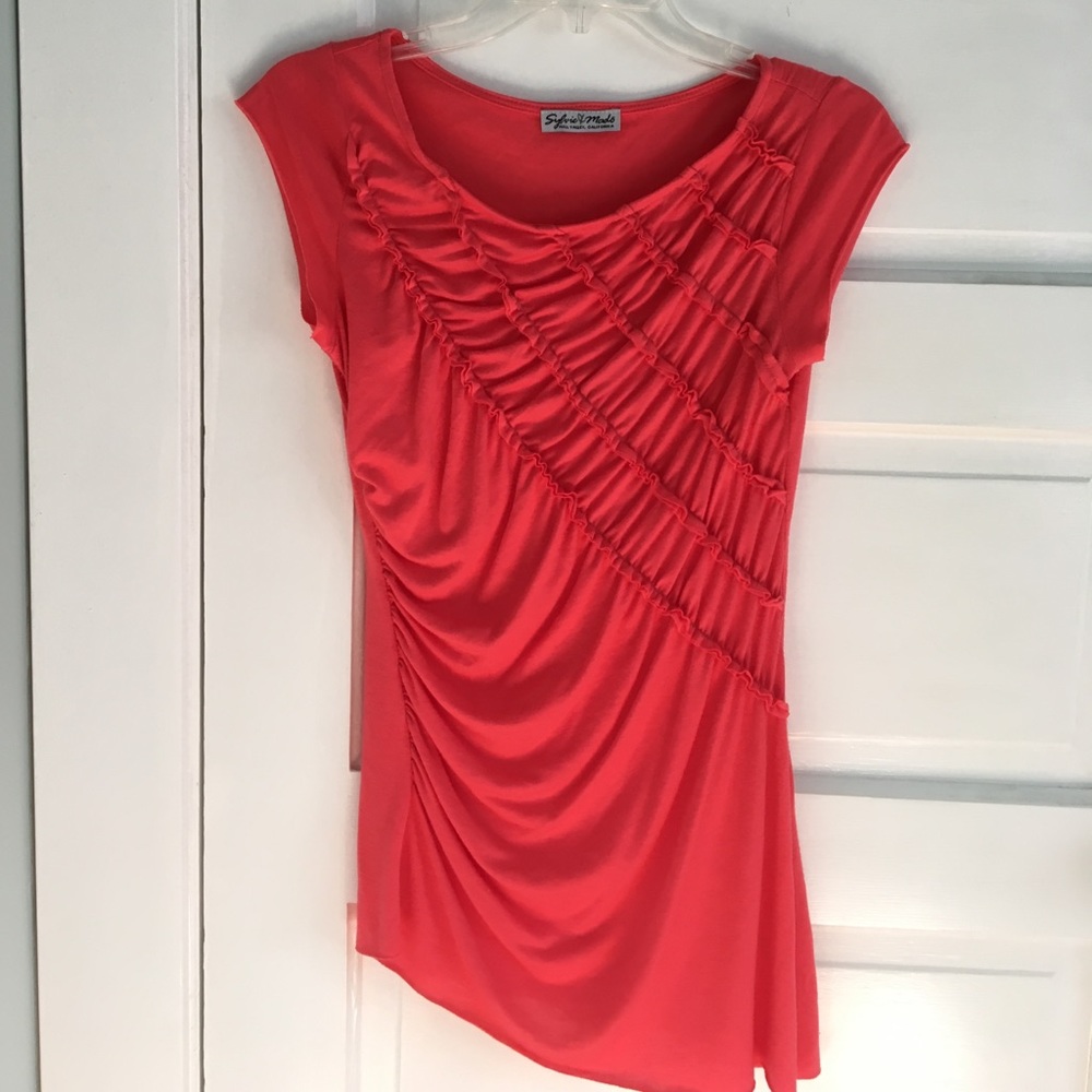 Coral red angle hem top