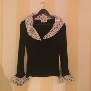 Polka Dot collared long sleeved shirt.