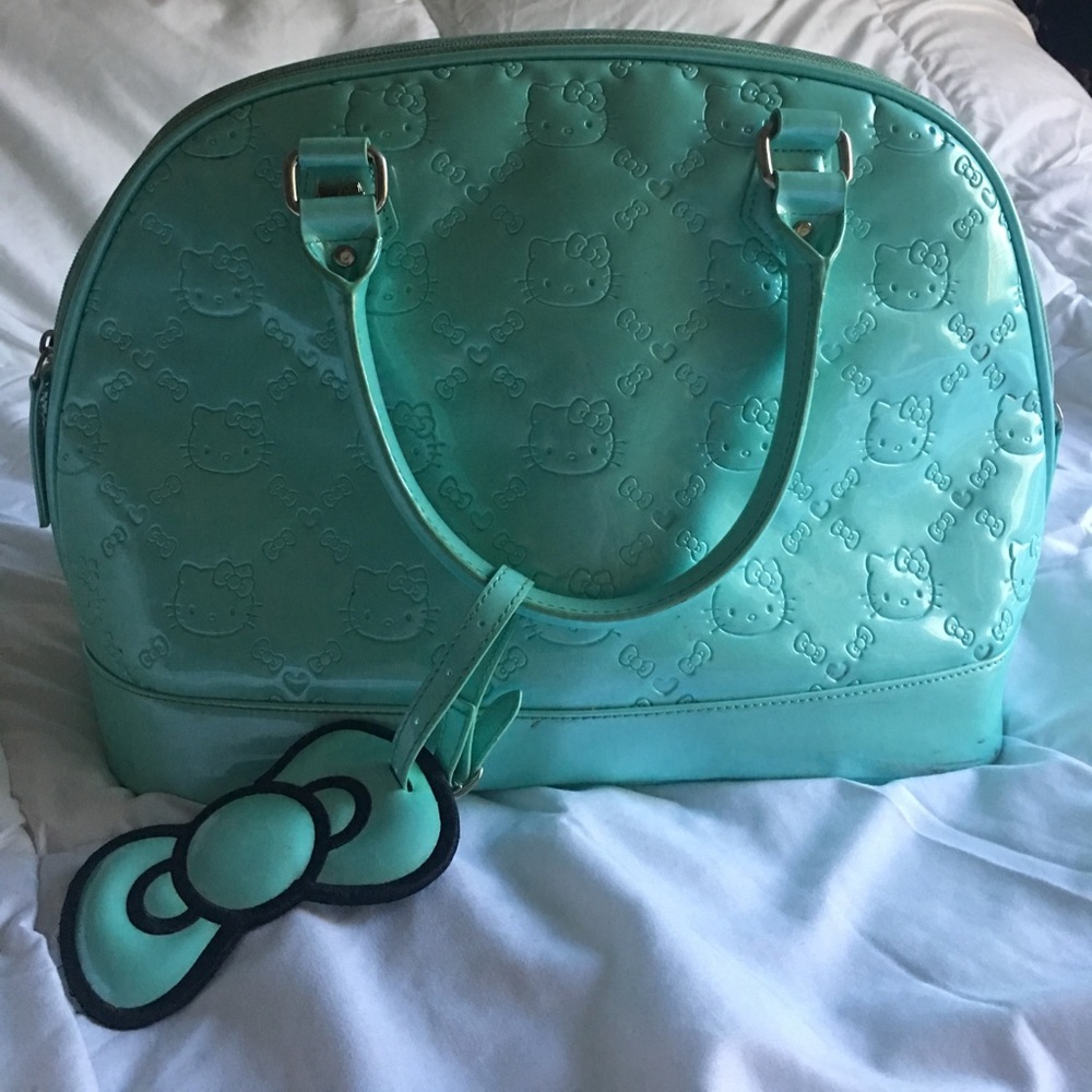 Hello kitty purse in teal