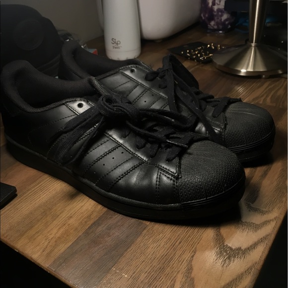 all black adidas superstars