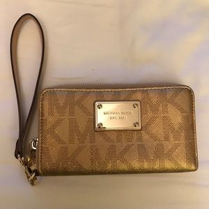 Michael Kors gold logo wristlet