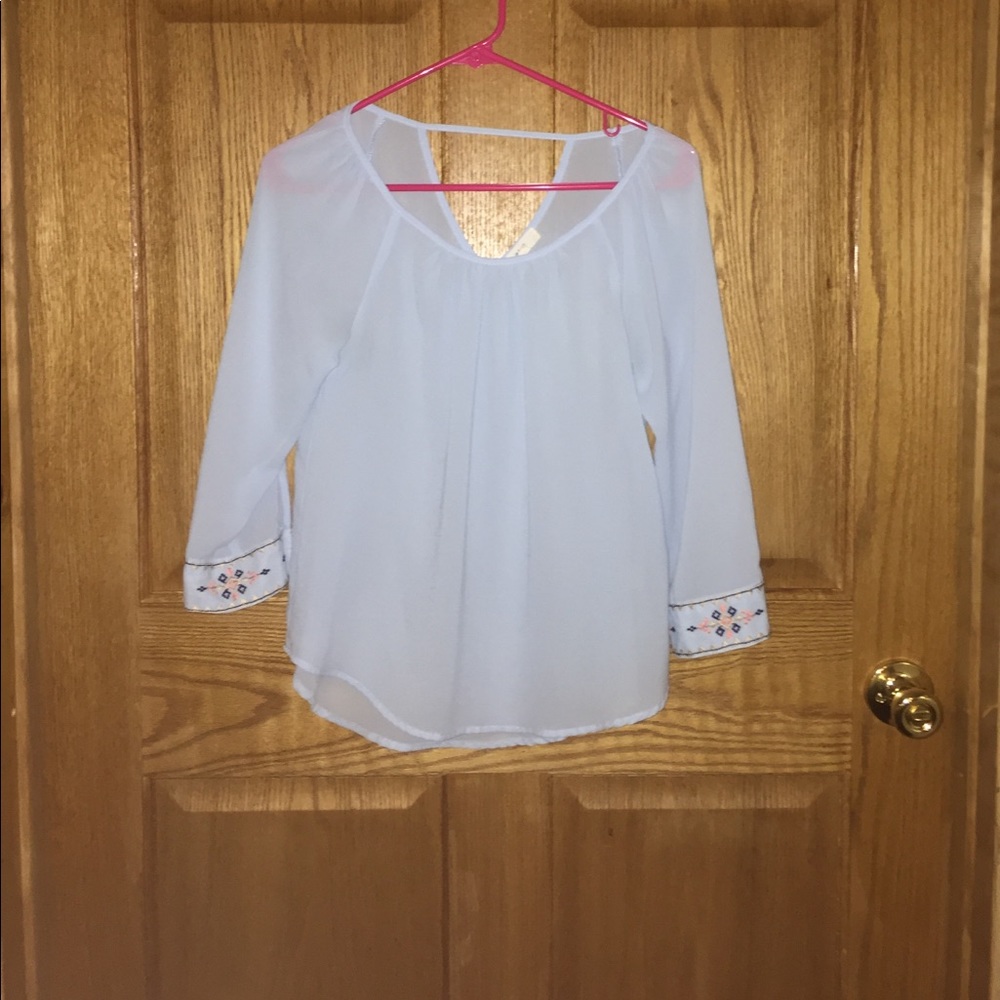 Light blue top