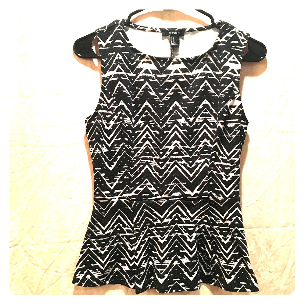 Peplum black & white sleeveless shirt