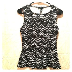 Peplum black & white sleeveless shirt