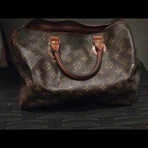 Vintage Louise Vuitton speedy bag