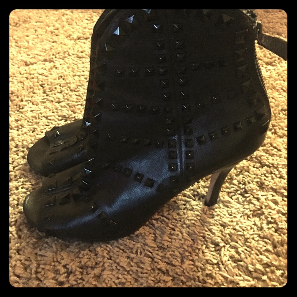 Black studded ankle booties.