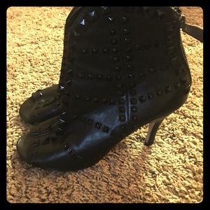 Black studded ankle booties.