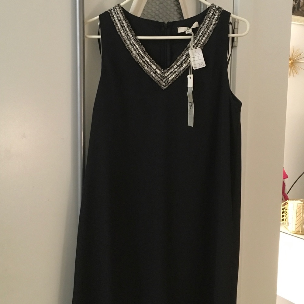 LBD swing dress with beaded v-neck