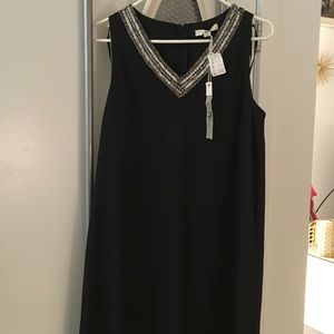 LBD swing dress with beaded v-neck