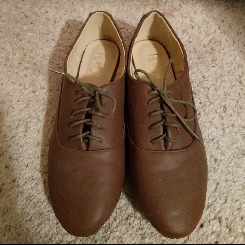Brown lace-up flats