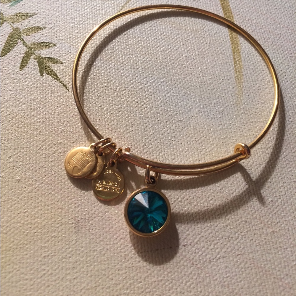 Gold with December gemstone Alex&Ani bracelet.