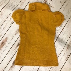 Yellow turtle neck sweater