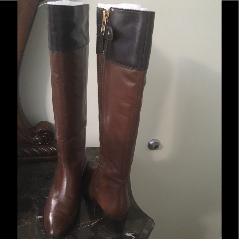 Diana von furstenburg Below the knee tall boots.