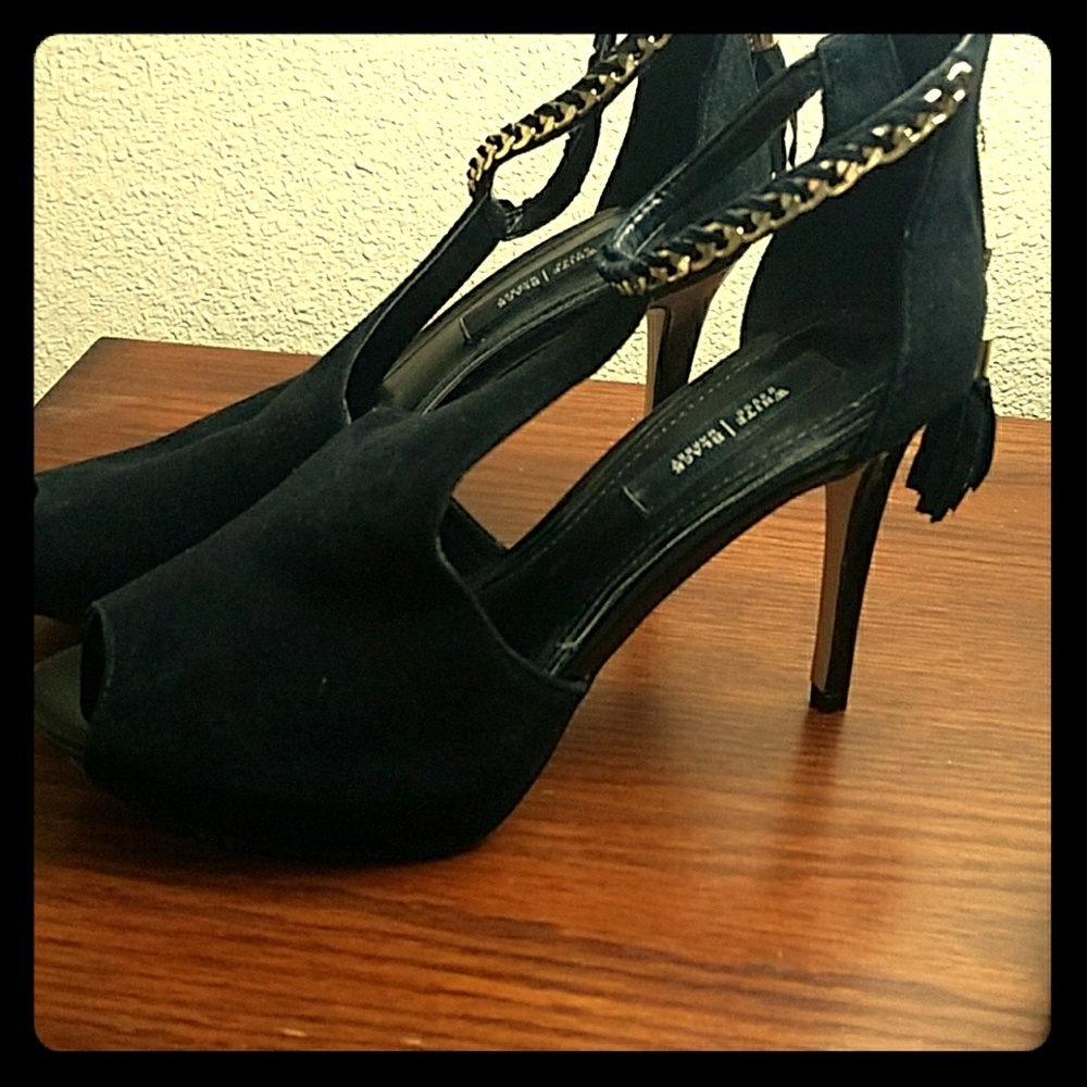 Black open toes heels.  Zipper in the back.