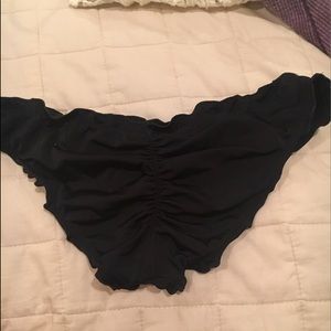 Black Victoria's Secret ruffled cheeky bottoms