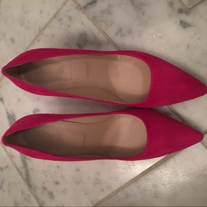 Hot pink suede pumps