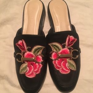 Never been worn size 7.5 slip on loafers w/ roses