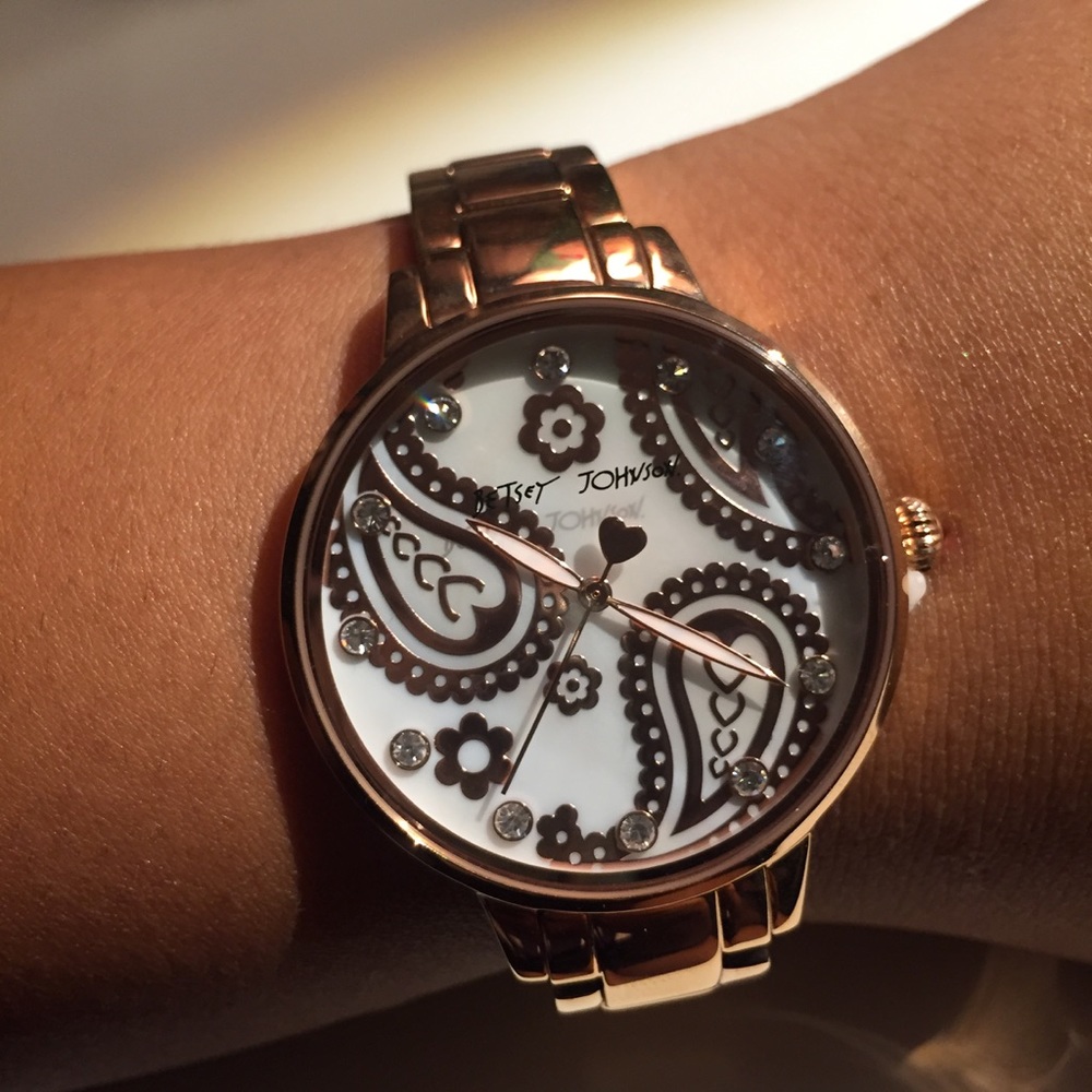 Rose gold watch with a paisley motif