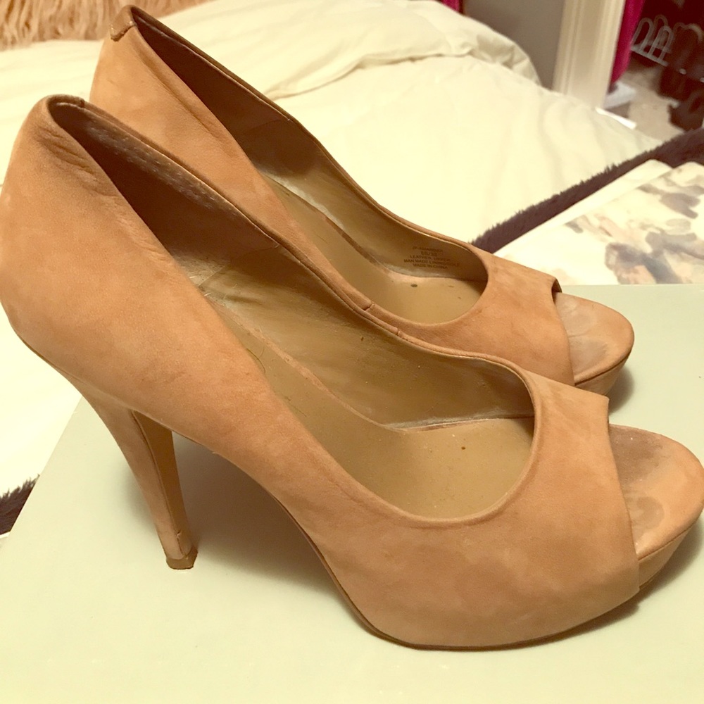 Gently worn pumps