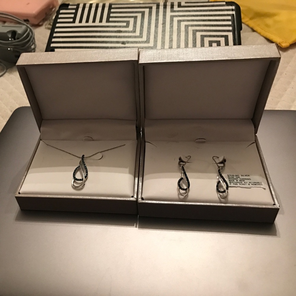 Matching sterling silver necklace and earrings.