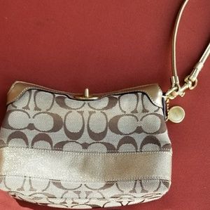 SOLD! Authentic COACH wristlet in great condition!