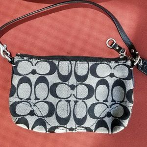 SOLD! COACH wristlet in excellent condition!