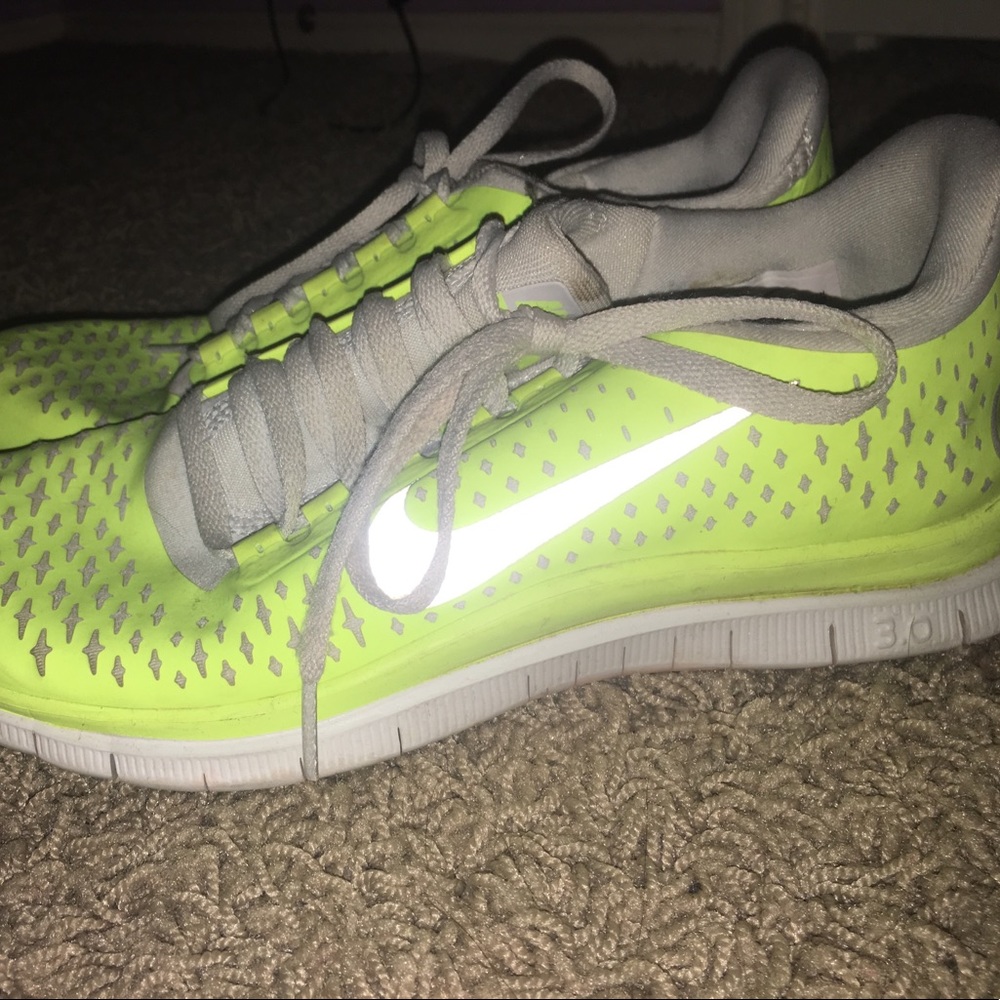 Neon and grey Nike Free runs