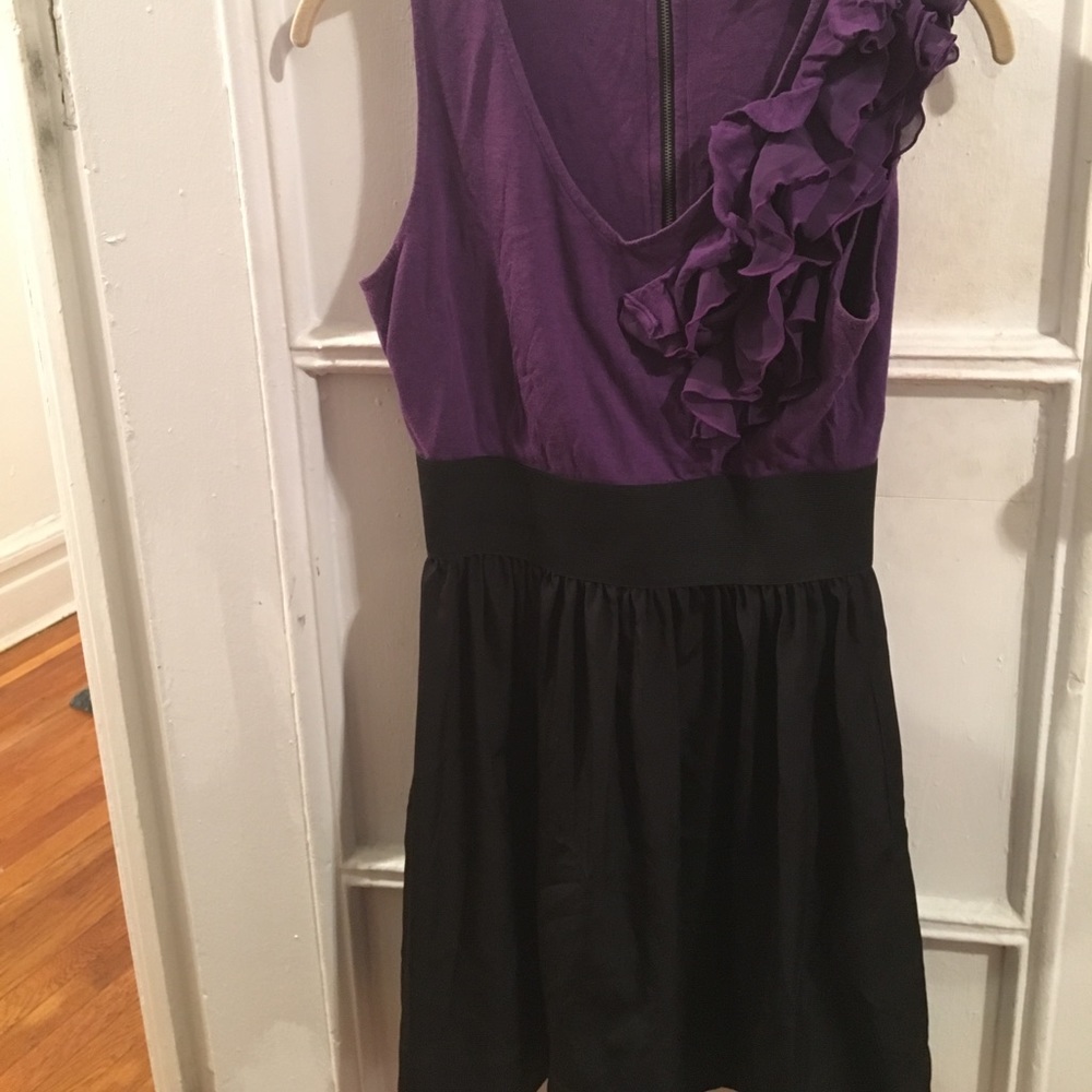 Flared purple dress with ruffle
