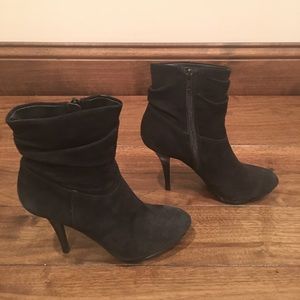 Black suede high heeled booties