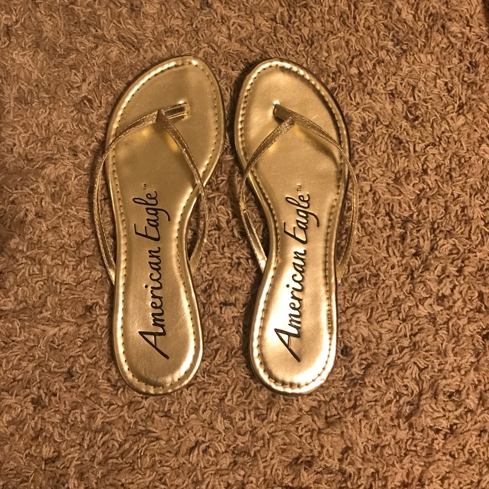 Gold AE flip flops /sandals