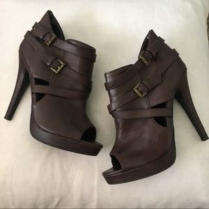 Dark brown booties by Delicious