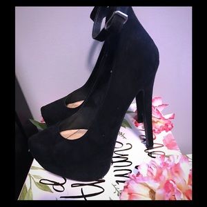 Cut black high heels with ankle strap