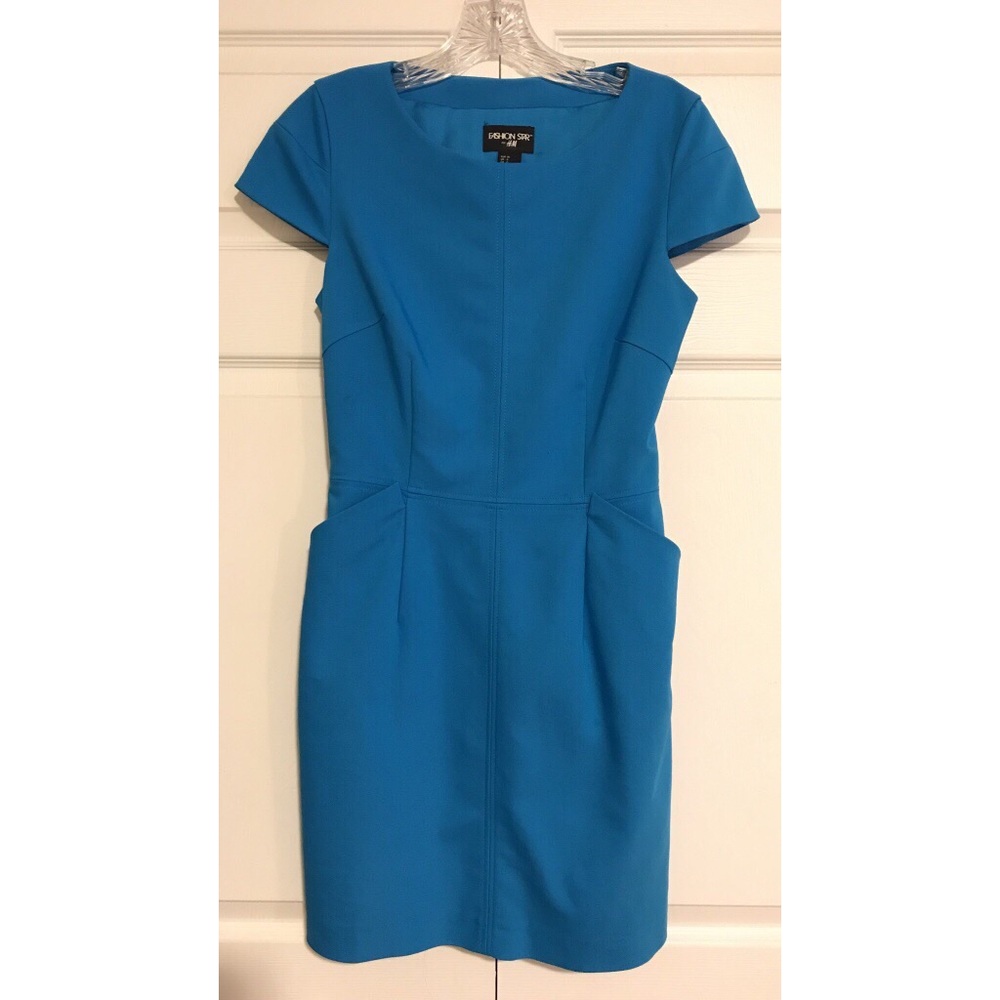 Dress with back cut out and side pockets