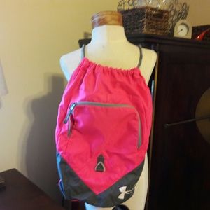 Pink and grey Under Armour back pack