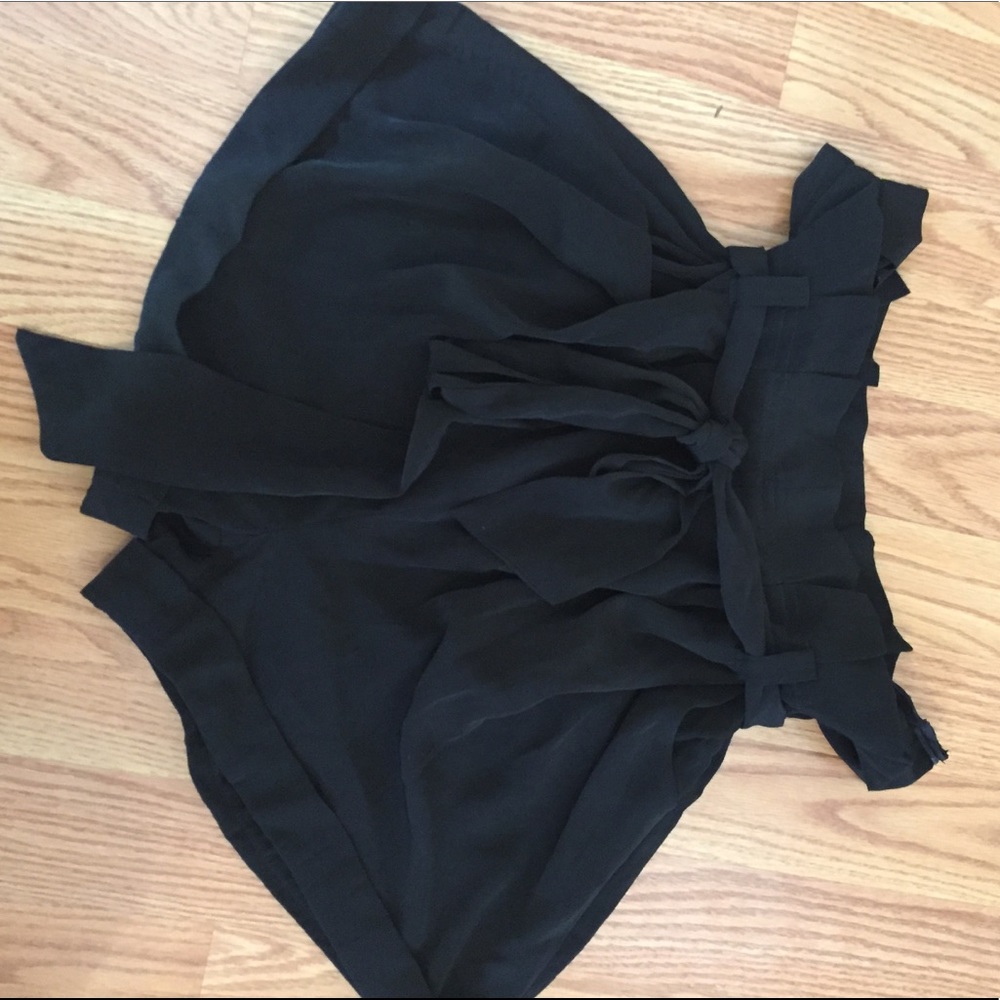 Flowy black shorts with removable tie- belt.