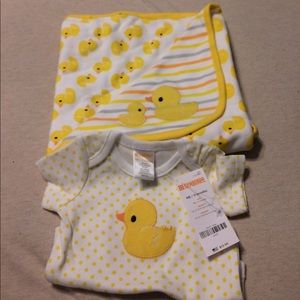 Newborn onesie with matching blanket