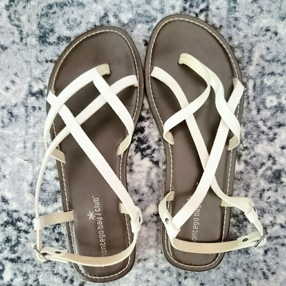 White faux leather strap sandals; brown sole