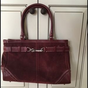 Maroon Coach bag.