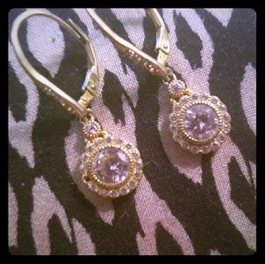 Diamond earrings one tiny diamond missing