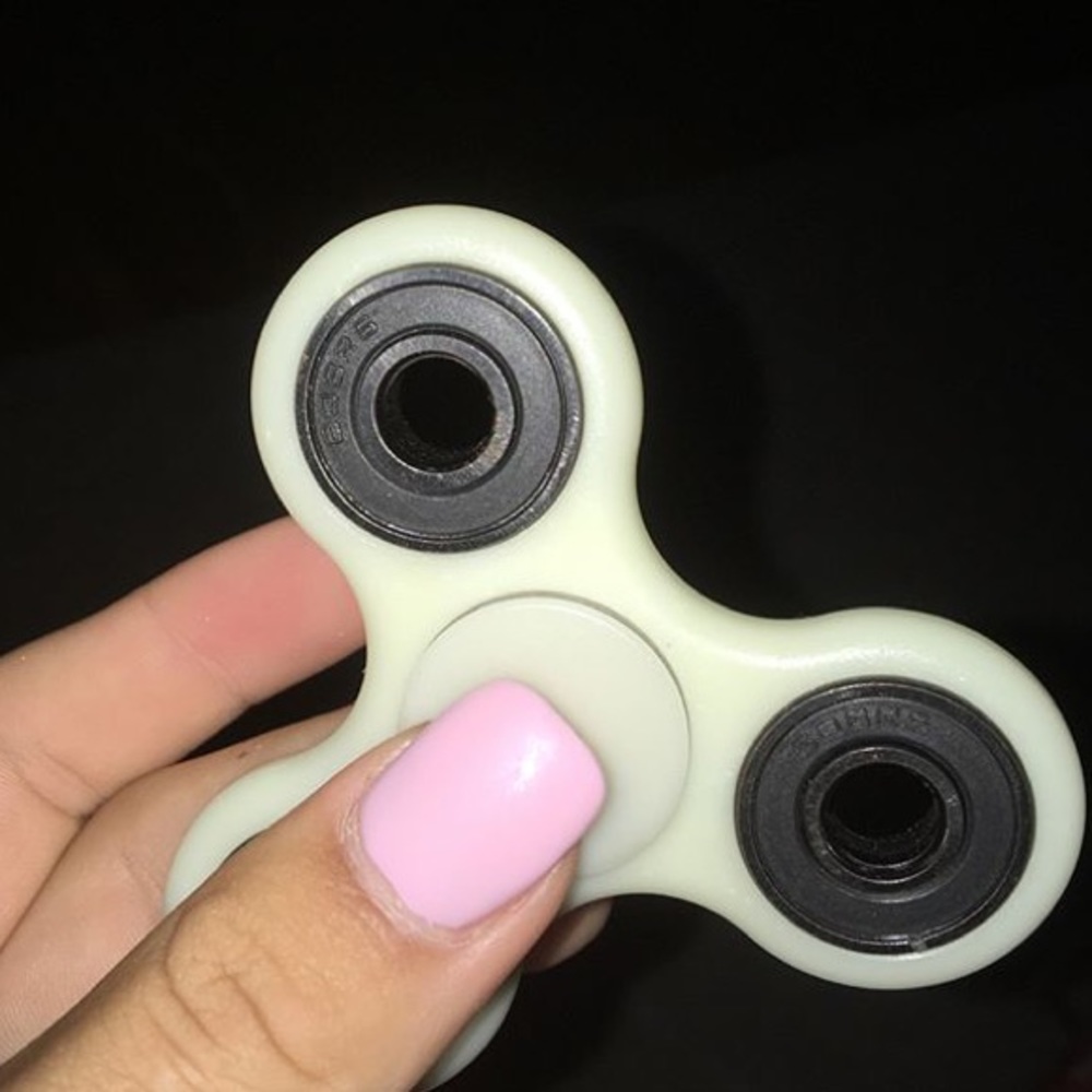 A glow in the dark fidget spinner