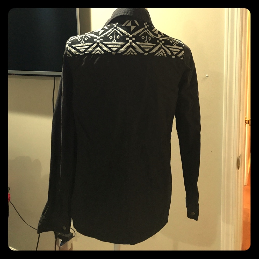Navy blue outerwear with tribal print
