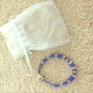 Blue beaded bracelet with jewelry bag included.