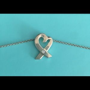 Tiffany & Co symbol for love necklace *negotiable*