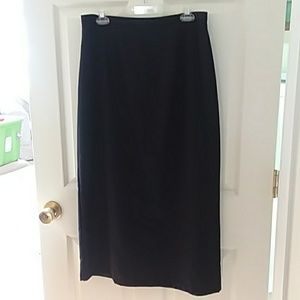 Long black skirt with button and slit in the back