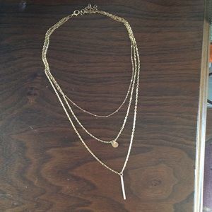 Gold three chain necklace
